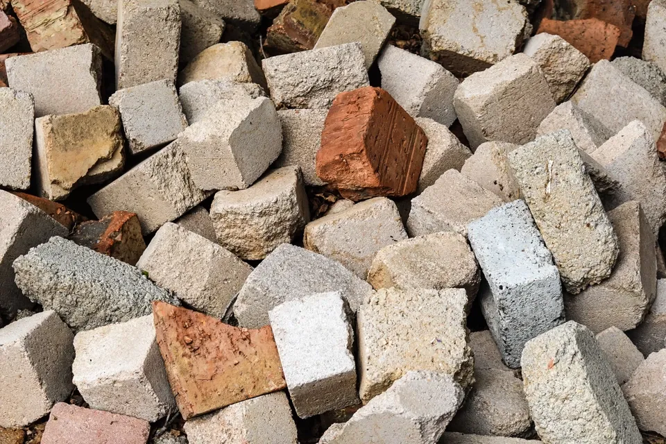 The same photograph of clean concrete and inert material, ungraded